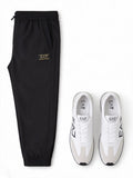 Emporio Armani Pantaloni tuta EA7 nero e oro